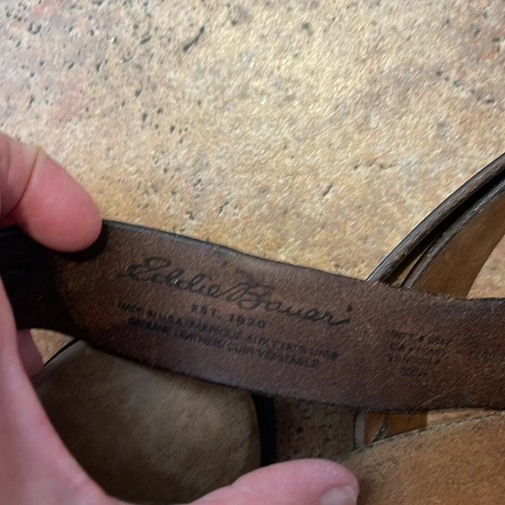 Very vintage Eddie Bauer, leather and grommet belt with brass buckle size 36